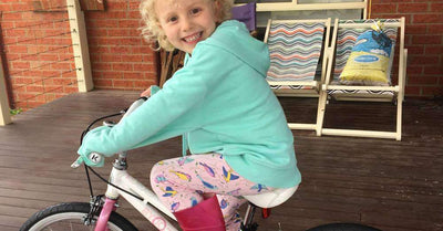 E-350 Kids bike rider proving well designed bike is all a kid needs!